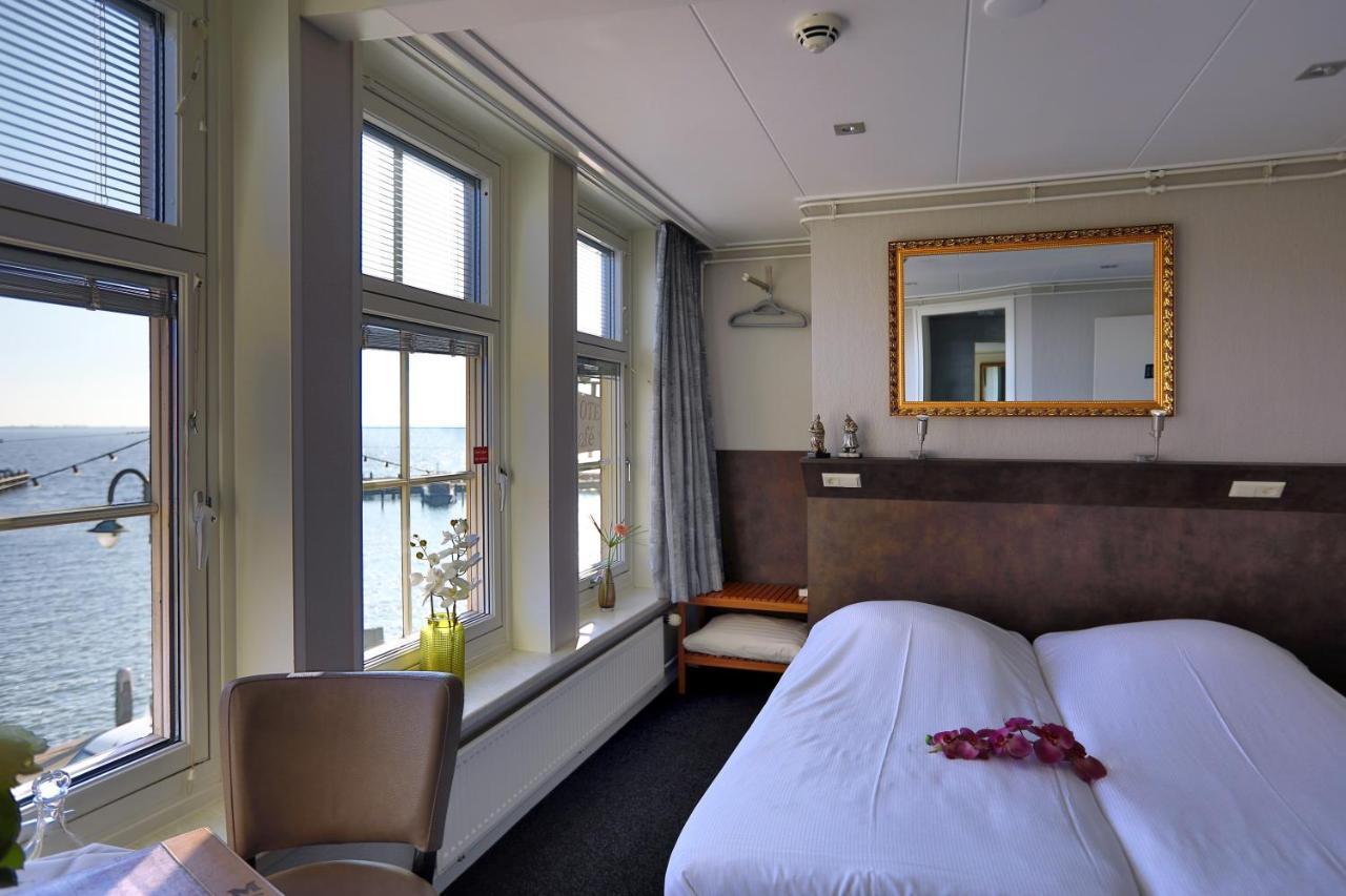 Hotel Cafe Restaurant Van Den Hogen Волендам Экстерьер фото